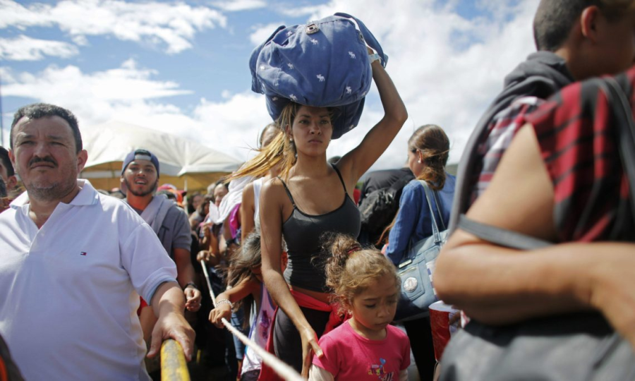 Venezuelan refugees arrive in Brazil. Photo: Ariana Cubillos, AP.