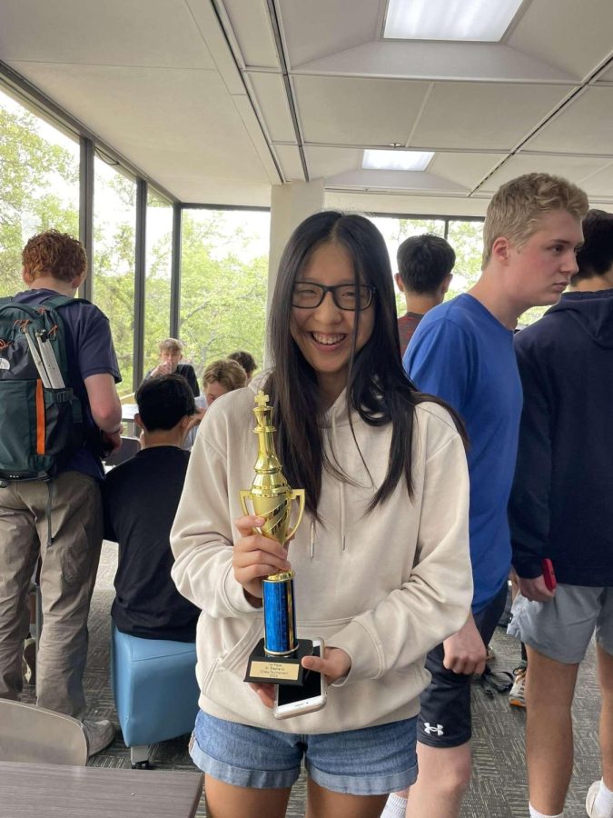 Audrey Wan (25) holds her trophy after winning the Chess Clubs tournament, which concluded on April 5th, 2023.