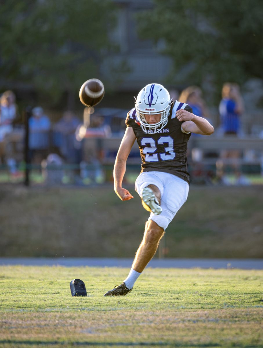 Kicker James Fear smashes this kickoff to the other team's endzone